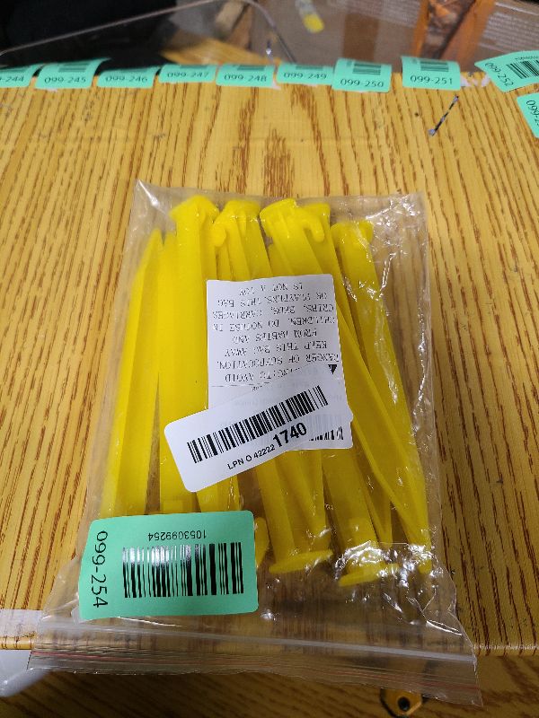 Photo 1 of 10 Pack Plastic Tent Stakes Heavy Duty Beach Tent Pegs Canopy Stakes for Camping Gardening Backpacking Tent Pegs Spike Hook for Outdoor Garden Decorations Lawn Tarp Sand Stakes for Beach (Yellow)