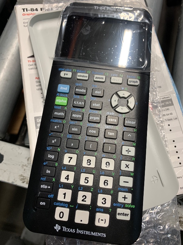 Photo 1 of (used)(see images) Texas Instruments TI-84 Plus CE Color Graphing Calculator, Black