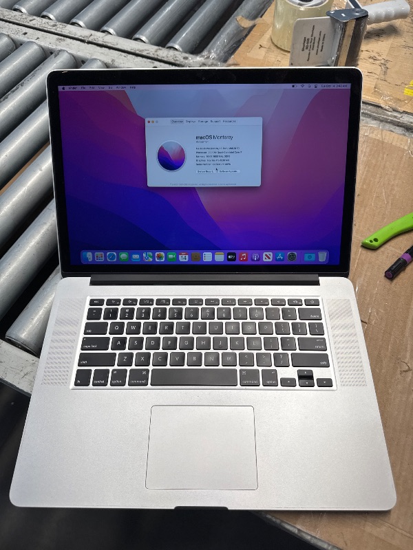 Photo 1 of (used/fair) (mid 2015) Apple MacBook Pro 15-Inch Laptop with Retina Display (2.2 GHz Intel Core i7 Processor, 16GB RAM, 256GB SSD) (Renewed)
