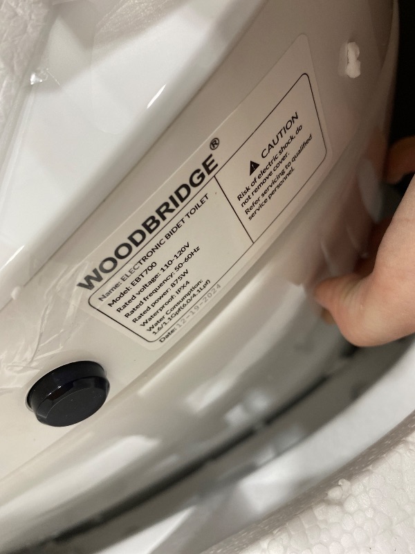 Photo 1 of **NO REMOTE CONTROL INCLUDED**WOODBRIDGE Smart Toilet, Auto Open & Close, Auto Flush, Foot Sensor Operation, Heated Seat and Integrated Multi Function Remote Control in White