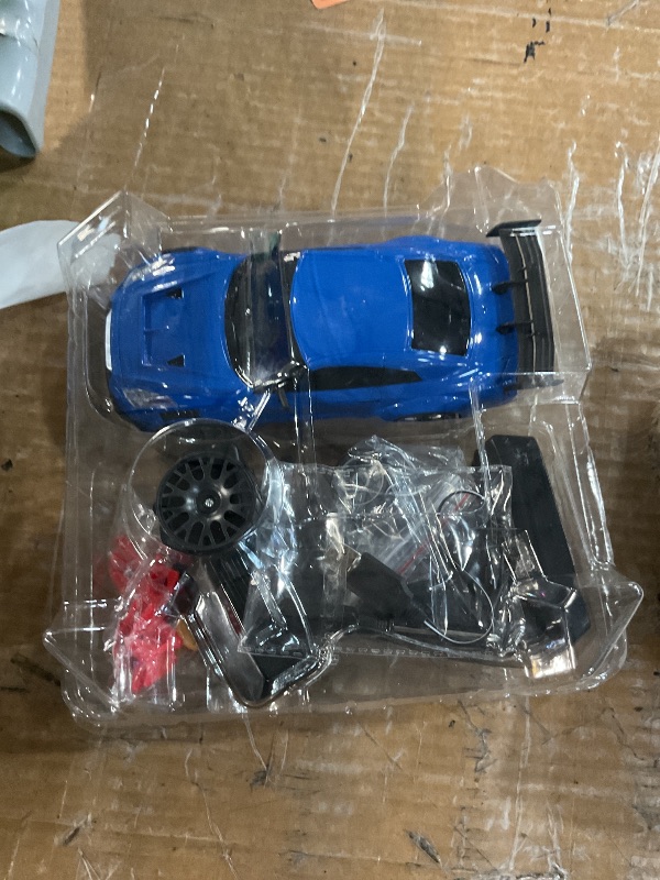 Photo 1 of ***(PARTS ONLY/ MISSING PARTS/ NON FUNCTIONAL)***ACAMMZAR RC Drift Car, 1:24 Remote Control Car for Kids, 20KM/H 4WD High Speed RC Cars with Lights, Extra Racing Tires, Vehicle for Adults Boys Girls, Blue