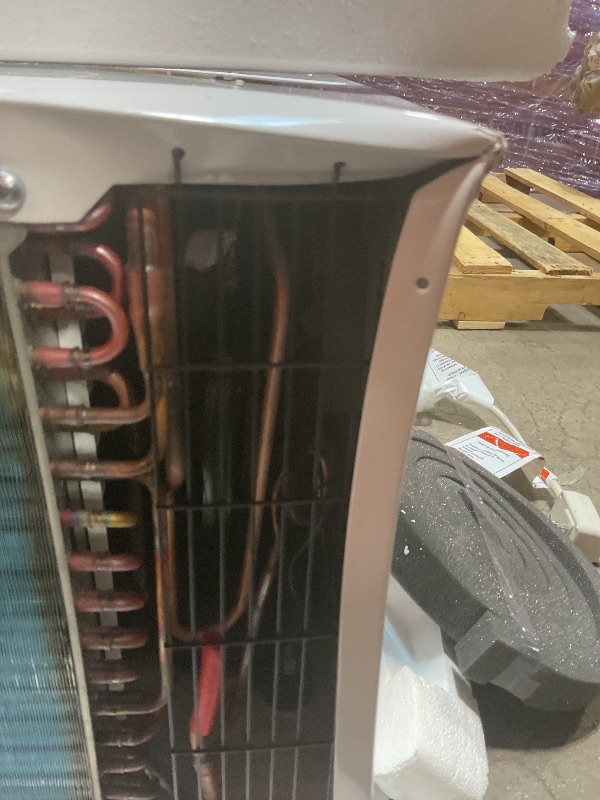 Photo 1 of **MINOR DAMAGE **Whirlpool 8,000 BTU Through the Wall Air Conditioner, 115V, Cools up to 350 Sq. Ft. for Living Room, Bedroom, Kitchen with Dehumidifier and Remote Control, White