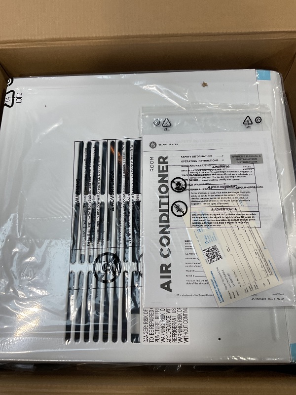 Photo 1 of ***MAJOR DAMAGE ***GE Window Air Conditioner 12,000 BTU for Rooms up to 550 sq ft., Wi-Fi Enabled, Energy-Efficient Cooling for Large Rooms, Easy Install Kit, Control Using Remote or Smartphone App, White