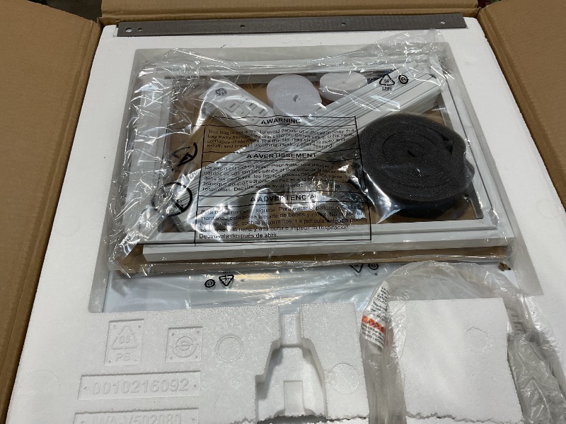 Photo 1 of ***MAJOR DAMAGE ***GE Window Air Conditioner 12,000 BTU for Rooms up to 550 sq ft., Wi-Fi Enabled, Energy-Efficient Cooling for Large Rooms, Easy Install Kit, Control Using Remote or Smartphone App, White