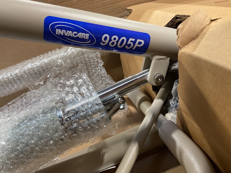 Photo 1 of ***possibly for parts/ untested**** Invacare Lightweight Hydraulic Patient Lift, White, 450 lb. Weight Capacity, 9805P, Beige