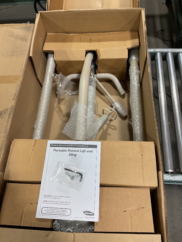 Photo 1 of ***possibly for parts/ untested**** Invacare Lightweight Hydraulic Patient Lift, White, 450 lb. Weight Capacity, 9805P, Beige