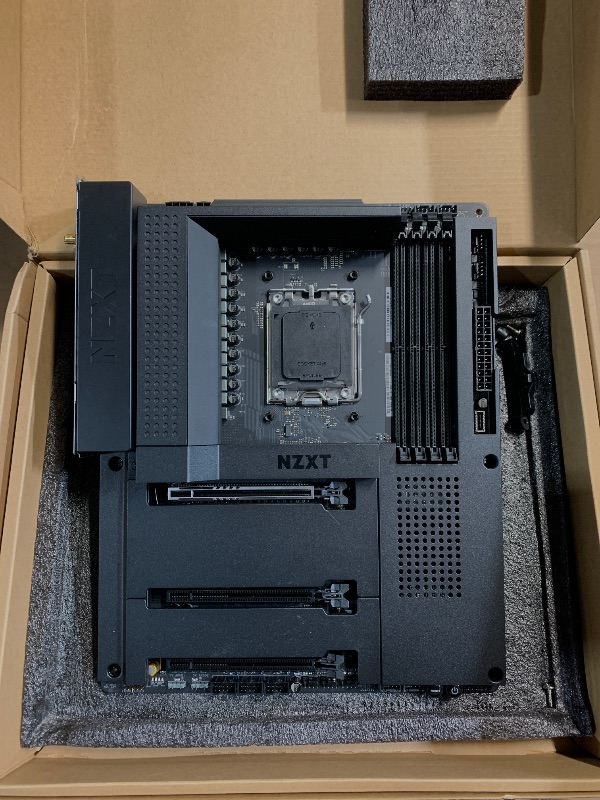 Photo 1 of *******************Damaged, bent/broken cpu socket pins****************
NZXT N7 B650E - AMD B650 Chipset - Supports AMD Ryzen 9000 8000 & 7000 Series CPUs (Socket AM5) - ATX Gaming Motherboard - Integrated Rear I/O Shield - DDR5 - Wi-Fi 6E - Black