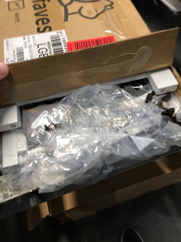 Photo 1 of (used/fair) (unknown missing items) Fldofaves Dog Gate - 18"-45" Adjustable Extra Wide Metal Baby Gate to Step Over, 10" Tall Small Pet Gate with 3 Extension Kits, Pressure Mounted for Doorways & Stairs