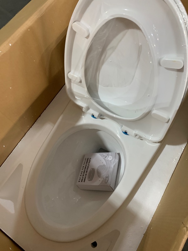 Photo 1 of  WOODBRIDGEE One Piece Toilet with Soft Closing Seat, Chair Height, 1.28 GPF Dual, Water Sensed, 1000 Gram MaP Flushing Score Toilet with Chorme Button, White,B0940-F-C