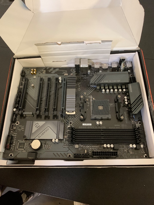 Photo 1 of GIGABYTE B550 Eagle WIFI6 Motherboard, Supports AMD AM4 Ryzen 5000 Processors, ATX, DDR4, 2X M.2, PCIe 4.0, WIFI6, 1GbE LAN, EZ-Latch