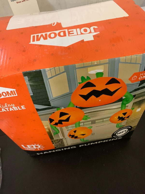 Photo 1 of Joiedomi 10 FT Tall Halloween Inflatables Outdoor Decoration, Inflatable Pumpkins Hanging on The Roof, Giant Halloween Yard Blow Up Pumpkin Decorations with LEDs for Roof Decor