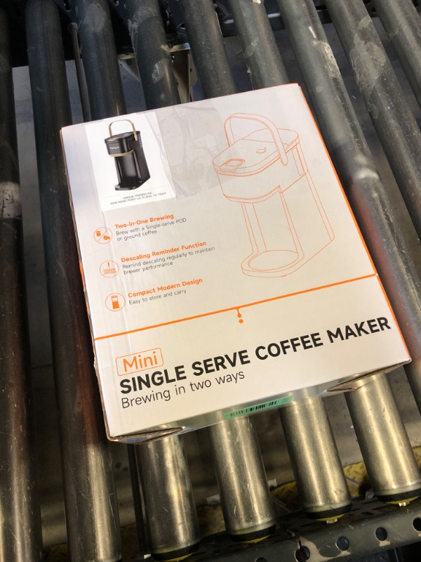 Photo 1 of Tastyle Single Serve One Cup Coffee Maker, for K Cups and Grounds, Mini Coffee Maker with Portable Handle, 6 to 12 Oz Brew Size, for Travel, Camping, Office, RV and Dorm, 120V, Black and Gold
