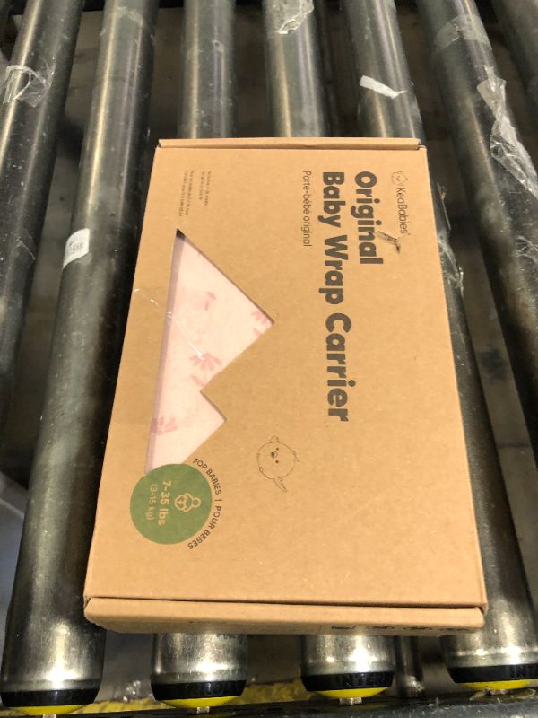 Photo 1 of KeaBabies Baby Wrap Carrier - All in 1 Original Baby Carrier Newborn to Toddler Sling, Easy to Wear, Hands Free Bonding, Lightweight, Breathable Infant Wraps (Pink Daisies)