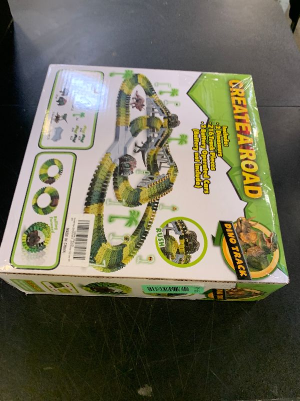 Photo 1 of Dinosaur Toys,Create A Dinosaur World Road Race,Flexible Track Playset and 2 pcs Cool Dinosaur car for 3 4 5 6 Year & Up Old boy Girls Best Gift