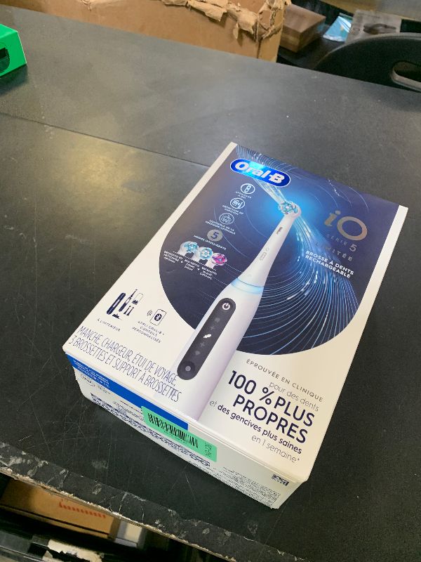 Photo 1 of Factory seal---Oral-B iO Deep Clean + Whiten Rechargeable Electric Toothbrush with Visible Pressure Sensor, 2 Minute Timer, 5 Cleaning Settings, 1 iO5 Limited, 3 Toothbrush Heads, Travel Case & Refill Holder, White