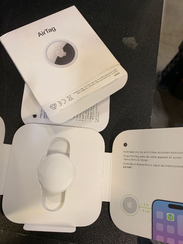 Photo 1 of Apple AirTag. Keep Track of and find Your Keys, Wallet, Luggage, Backpack, and More. Simple one-tap Set up with iPhone or iPad