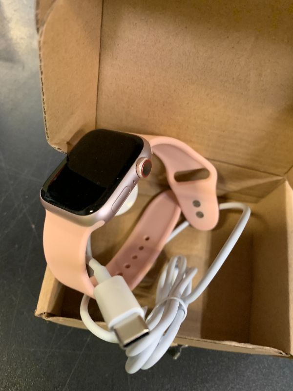 Photo 1 of **Locked
** Apple Watch Series 9 [GPS + Cellular 41mm] Pink Aluminum Case with Pink Sport Band M/L (Renewed Premium)