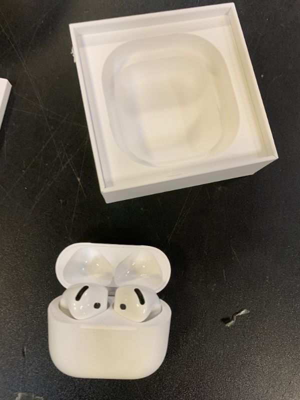 Photo 1 of Apple AirPods 4 Wireless Earbuds, Bluetooth Headphones, Personalized Spatial Audio, Sweat and Water Resistant, USB-C Charging Case, H2 Chip, Up to 30 Hours of Battery Life, Effortless Setup for iPhone