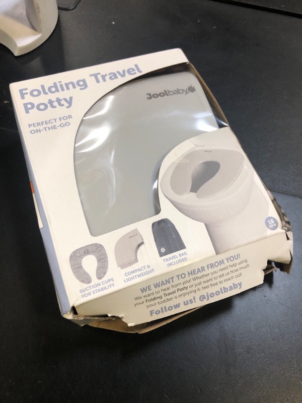 Photo 1 of Jool Baby Folding Travel Potty Training Seat for Toddlers, Fits Round & Oval Toilets, Non-Slip Suction Cups, Includes Free Travel Bag (Gray)