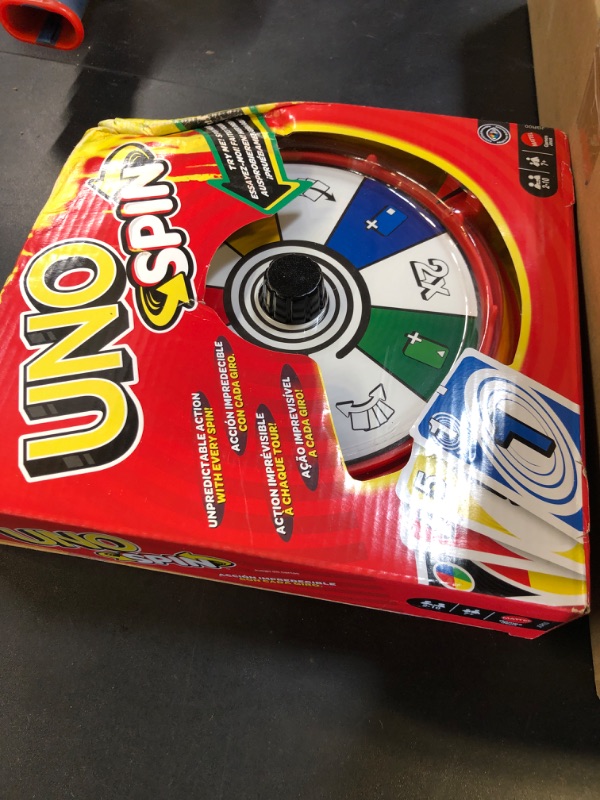 Photo 1 of Mattel Games UNO Spin Card Game for Kid, Adult & Family Nights, Classic Play with Toy Spinner, New Challenges & Rules, Rainy Day Activity
