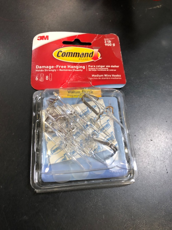 Photo 1 of Command Medium Clear Wire Toggle Hooks, 6 Hooks and 8 Command Strips, Damage-Free Hanging Wall Hangers for Hanging Home Decor, Holds up to 2 lb