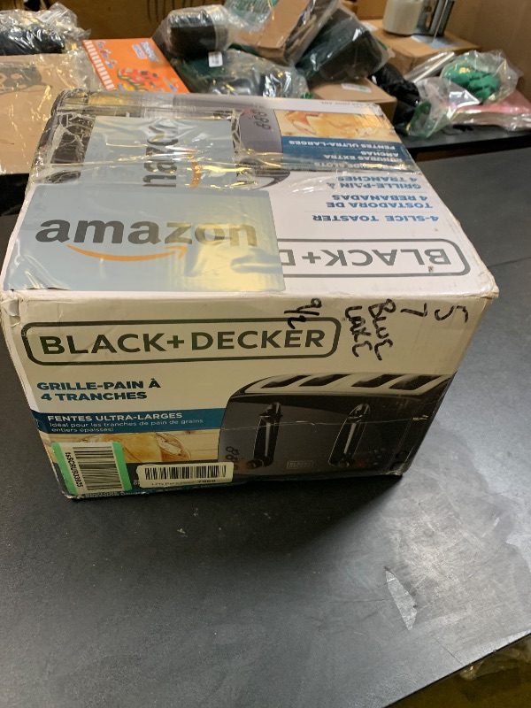 Photo 1 of BLACK+DECKER 4-Slice Toaster, TR1410BD, Extra-Wide, 7 Shade Settings, Crumb Trays, Gloss Black