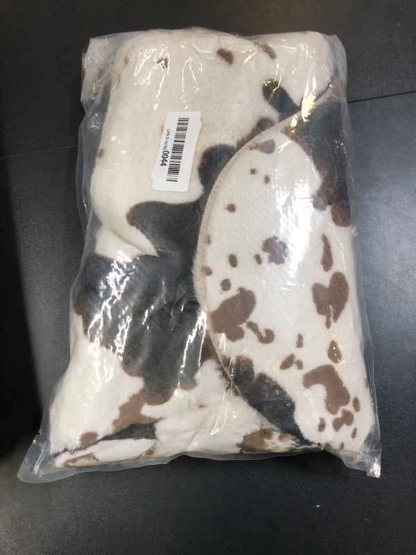 Photo 1 of Aoczes Faux Cowhide Rug Cute Cow Print Rug Cow Rugs for Bedroom Living Room Nursery Western Home Decor Area Rug, Brown and White 4.6 x 5.2 Feet