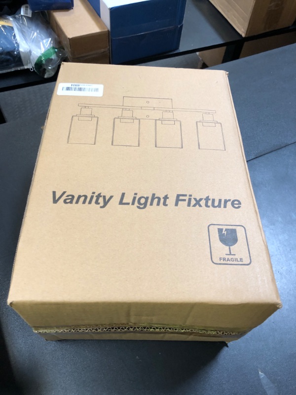 Photo 1 of Indoi 4 Light Bathroom Light Fixtures, Oil-Rubbed Bronze Modern Vanity Lights with Clear Glass Shades, Bathroom Wall Lamp for Mirror Living Room Cabinet