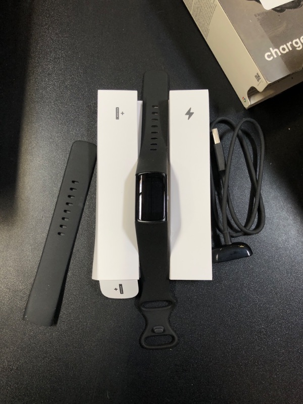 Photo 1 of Fitbit Charge 6 Fitness Tracker with Google apps, Heart Rate on Exercise Equipment, 6-Months Premium Membership Included, GPS, Health Tools and More, Obsidian/Black, One Size (S & L Bands Included)