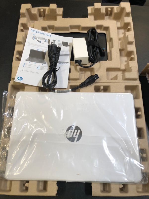 Photo 1 of HP 14 Laptop, Intel Celeron N4020, 4 GB RAM, 64 GB Storage, 14-inch Micro-edge HD Display, Windows 11 Home, Thin & Portable, 4K Graphics, One Year of Microsoft 365 (14-dq0040nr, Snowflake White)