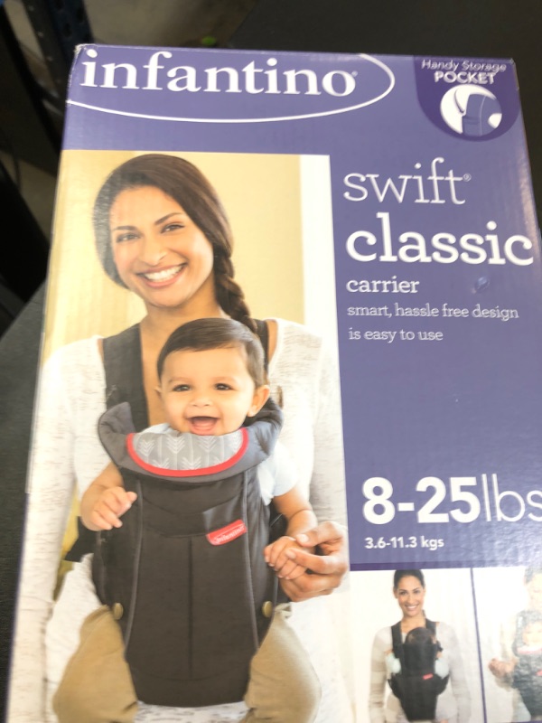 Photo 1 of Infantino Swift Classic Carrier with Pocket, 2-Ways to Carry Carrier with Wonder Bib & Essentials Storage Front Pocket for Babies 8-25lb, Adjustable Strap, Black