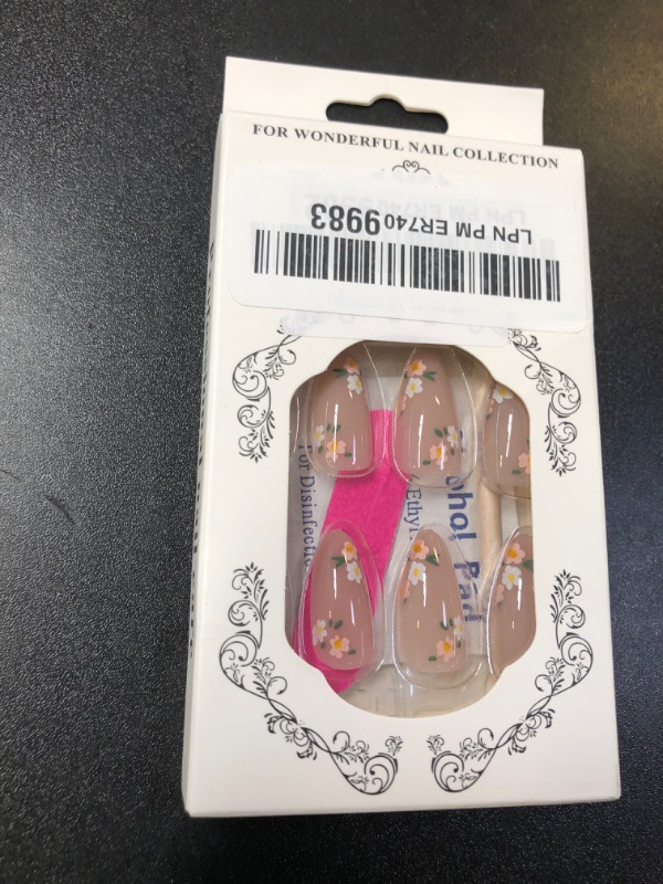 Photo 1 of OHWODA Pink Spring Press on Nails Almond Shape Fake Nails with Small Flower Designs Daisy Floral Artificial Nails Medium Length Spring Summer Glue on Nails Flowers Stick on Nails for Women, 24Pcs