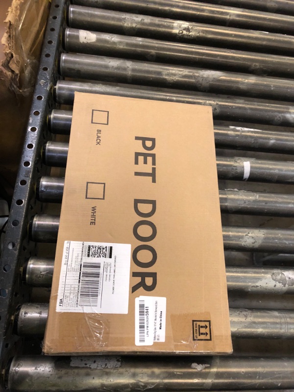 Photo 1 of Fldofaves Dog Gate - 18"-45" Adjustable Extra Wide Metal Baby Gate to Step Over, 10" Tall Small Pet Gate with 3 Extension Kits, Pressure Mounted for Doorways & Stairs