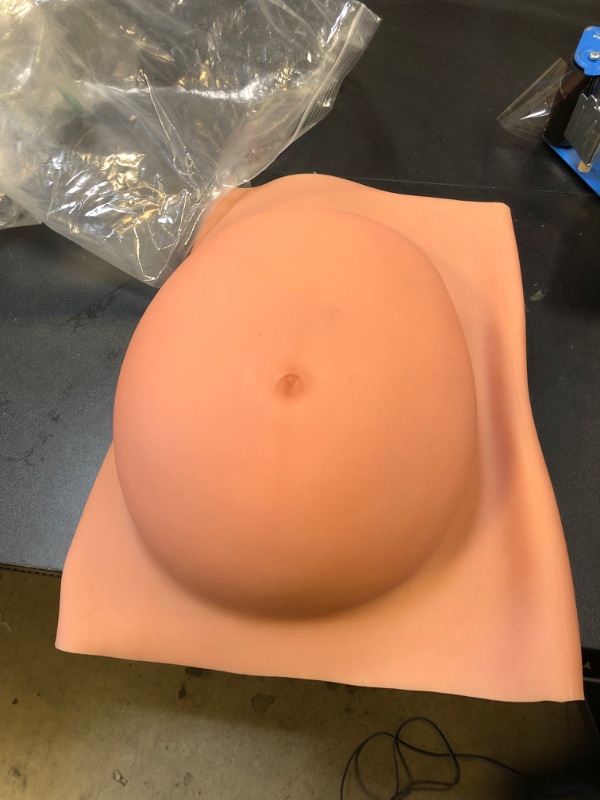 Photo 1 of MOTLEYBEAN Fake Pregnant Belly 6-9 Months Artificial Silicone Pregnancy Belly Lifelike Skin for Actor Performance Maternity (Brown,9 Months)