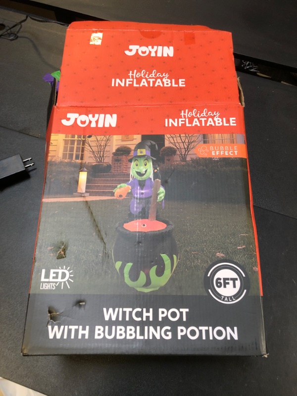 Photo 1 of JOYIN 6 FT Halloween Witch Inflatables Outdoor Decorations and Cauldron with Bubbling Potion and Light Inflatable Decoration Giant Blow Up Yard Halloween Decorations for Outdor Yard Lawn Party Decor