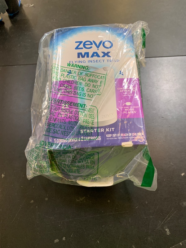 Photo 1 of Zevo MAX Bug Catcher & Fly Trap for Indoors - Flying Insect Trap for Gnats, House & Fruit Flies - Use in Any Room - No-Mess Disposal (1 Plug in Base & 2 Cartridges)