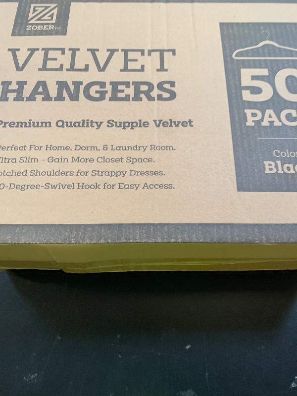 Photo 1 of Zober Velvet Hangers 50 Pack - Black for Coats, Pants & Dress Clothes - Non Slip w/ 360 Degree Swivel, Holds up to 10 lbs - Strong Felt Hangers for Clothing