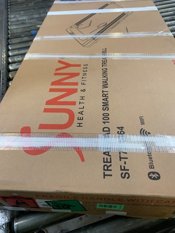 Photo 1 of Sunny Health & Fitness Treadpad 100 Smart Walking Treadmill – Compact, Portable, Under Desk, No Assembly, WiFi & Bluetooth SunnyFit App, Remote Control, LED Display, Shock Absorption - SF-T724064