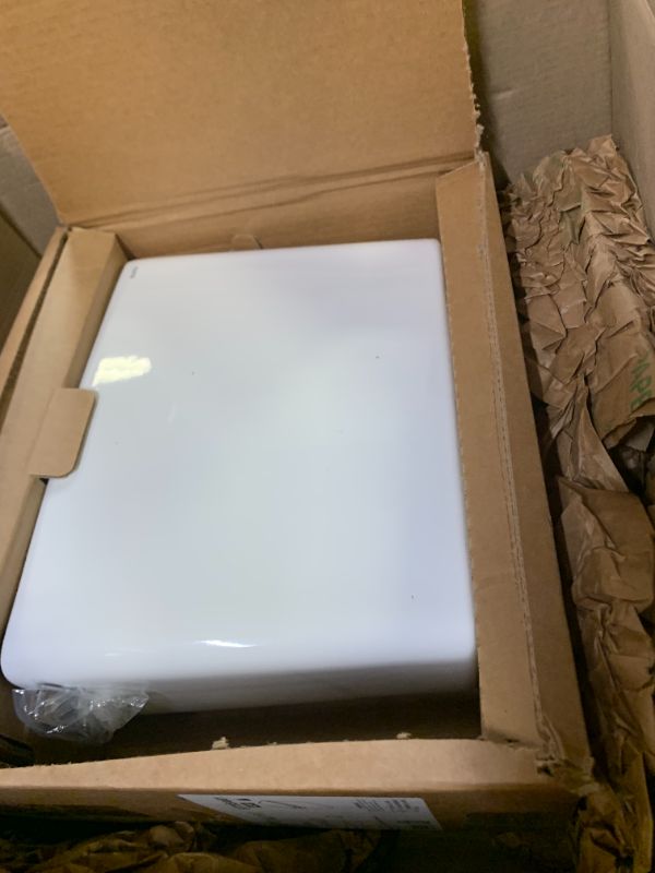 Photo 1 of TOTO Drake Two-Piece Elongated 1.6 GPF TORNADO FLUSH Toilet with CEFIONTECT, Cotton White - CST776CSG#01