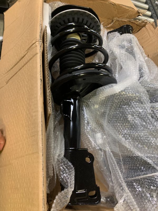 Photo 1 of strut shock assembly with coil bilizer sway bar end links 