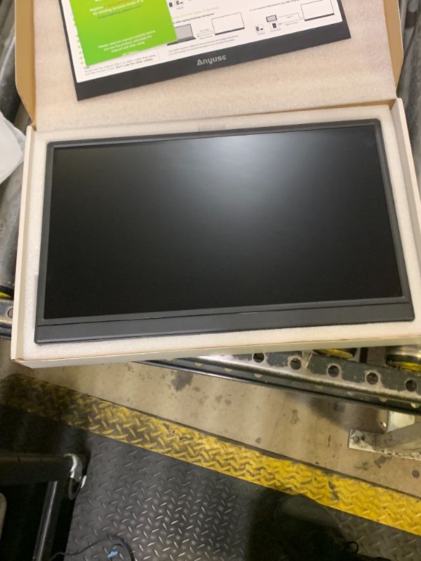 Photo 1 of Anyuse Portable Monitor 15.6 Inch 1080P USB-C HDMI Ultra-Slim Travel Monitor with Kickstand, for Laptop, PC, Mac Phone, PS, Xbox, Swich IPS Ultra-Thin Zero Frame Gaming