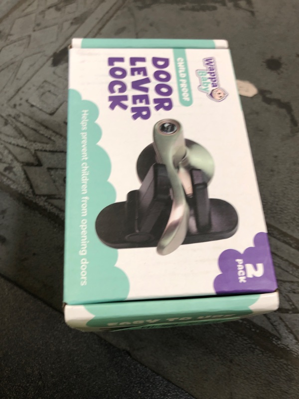Photo 1 of Door Lever Lock (2 Pack) Prevents Toddlers from Opening Doors. 3.25" L * 1.5" W * 4.5" H Easy One Hand Operation for Adults. Durable ABS with 3M Adhesive Backing. Simple Install, Black