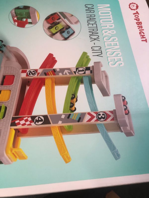 Photo 1 of TOP BRIGHT Car Ramp Toy for 2 3 Year Old Boy Gifts, Toddler Race Track Toy for 18 Month Old with 4 Wooden Cars and 3 Car Garage