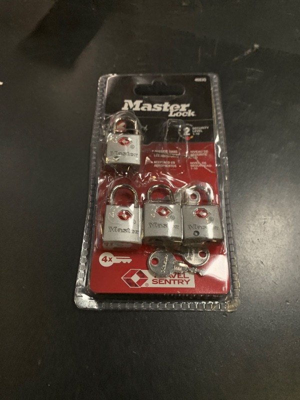 Photo 1 of Master Lock Brass TSA Locks for Luggage with Key, TSA Approved Keyed Padlock for Backpacks, Suitcases, and Luggage, Zipper Lock, 4 Pack, 4683Q