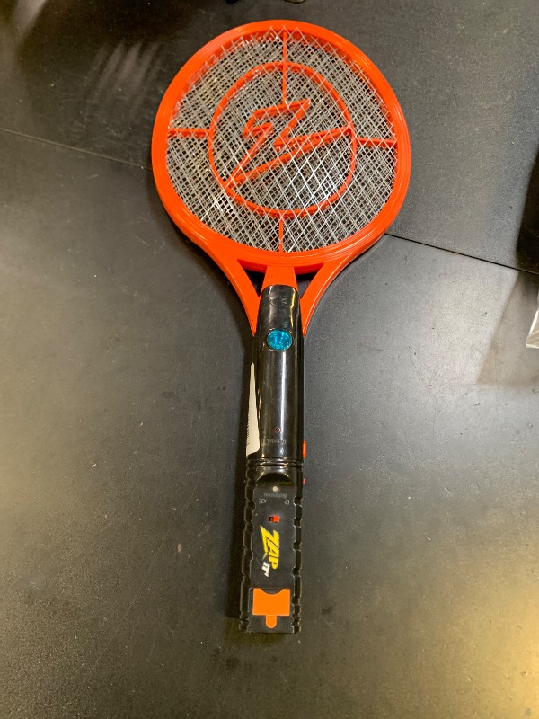 Photo 1 of ZAP IT! Rechargeable Electric Fly Swatter Racket - 4,000-Volt Mosquito Zapper with USB Charging and LED Light - Medium - Safe 3-Layer Mesh Bug Zapper Racquet for Indoors and Outdoors - Red