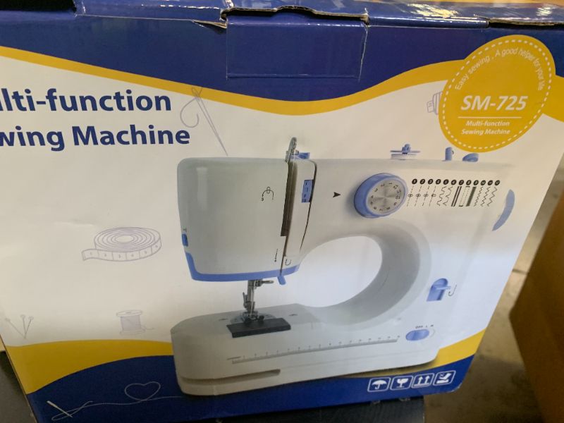 Photo 1 of Stoigeld Sewing Machine for Beginners with 20 Pcs Fabric and 32 Pcs Sewing Threads Kit,Portable Sewing Machine with 12 Built-in Stitches,2 Speed(High-Low Speeds) - White Blue