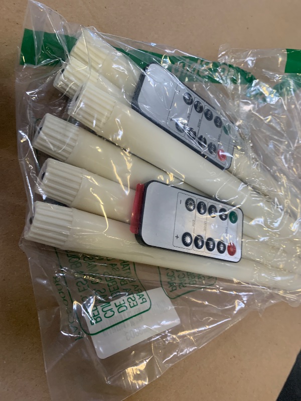 Photo 1 of Homemory 11 inches Waxy Flameless Taper Candles with Remote Timer Dimmer, 6 Pcs Battery Operated Taper Candles with Flickering Flame, Ivory LED Candlesticks for Wedding, Christmas Indoor Decoration