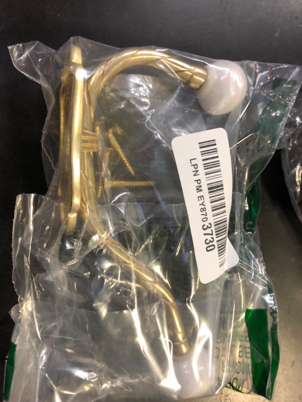Photo 1 of Renovators Supply Manufacturing Wall Hooks 6 1/4 in. Brass Coat Hook with Porcelain Ball Tip and Mounting Hardware
