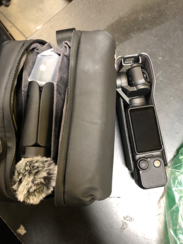Photo 1 of DJI Osmo Pocket 3 Creator Combo, Vlogging Cameras with 1'' CMOS, 4K/120fps Vlog Camera, 3-Axis Stabilization, Face/Object Tracking, Mic Included for Clear Sound, Digital Vlogging Camera for YouTube