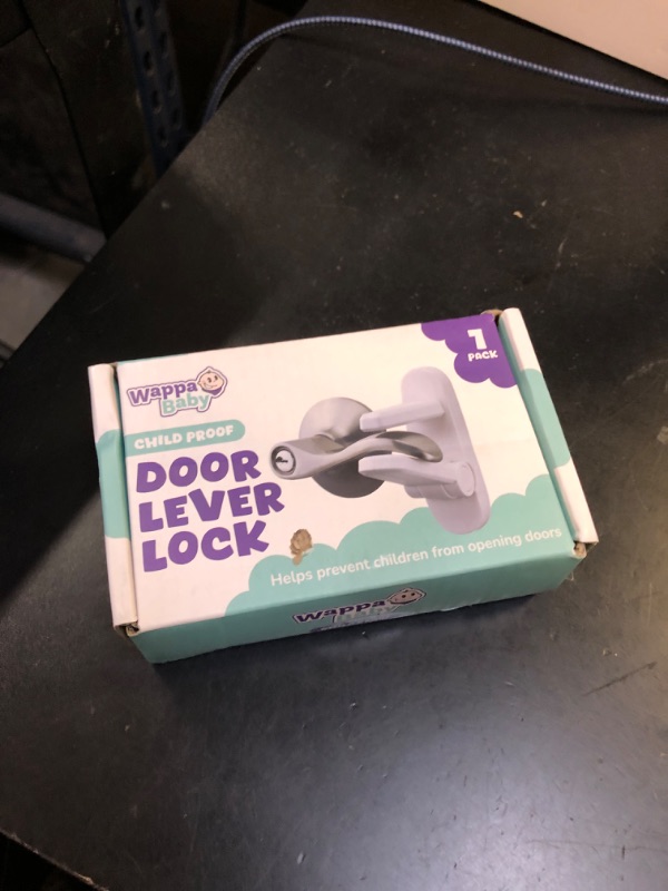 Photo 1 of Door Lever Lock (1 Pack) Prevents Toddlers from Opening Doors. 3.25" L * 1.5" W * 4.5" H Easy One Hand Operation for Adults. Durable ABS with 3M Adhesive Backing. Simple Install, No Tools Needed.